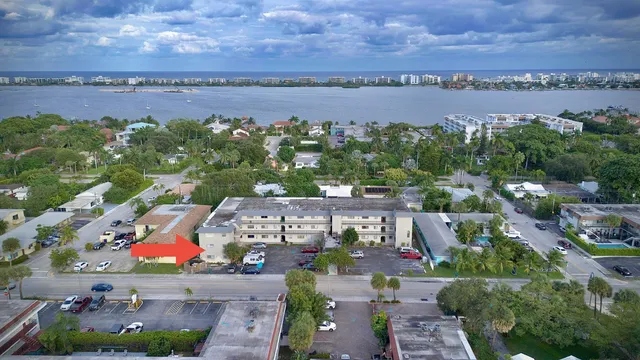 an aerial view of a houses with outdoor space