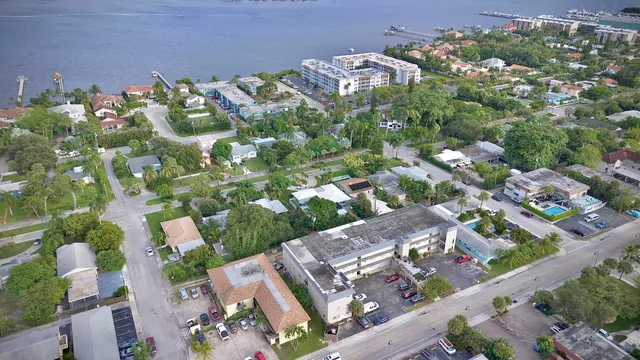 an aerial view of residential houses with outdoor space