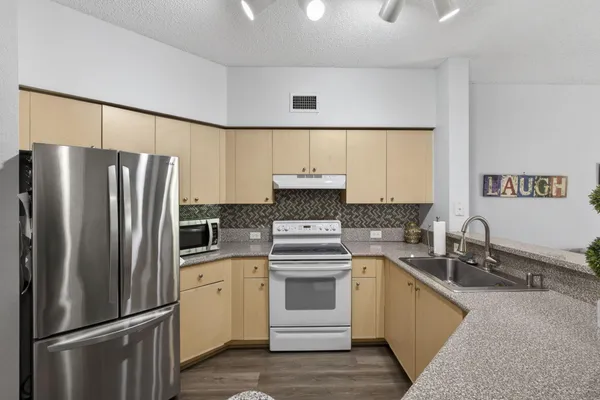 $300,000 | 310 Crestwood Circle, Unit 208, Royal Palm Beach, FL 33411