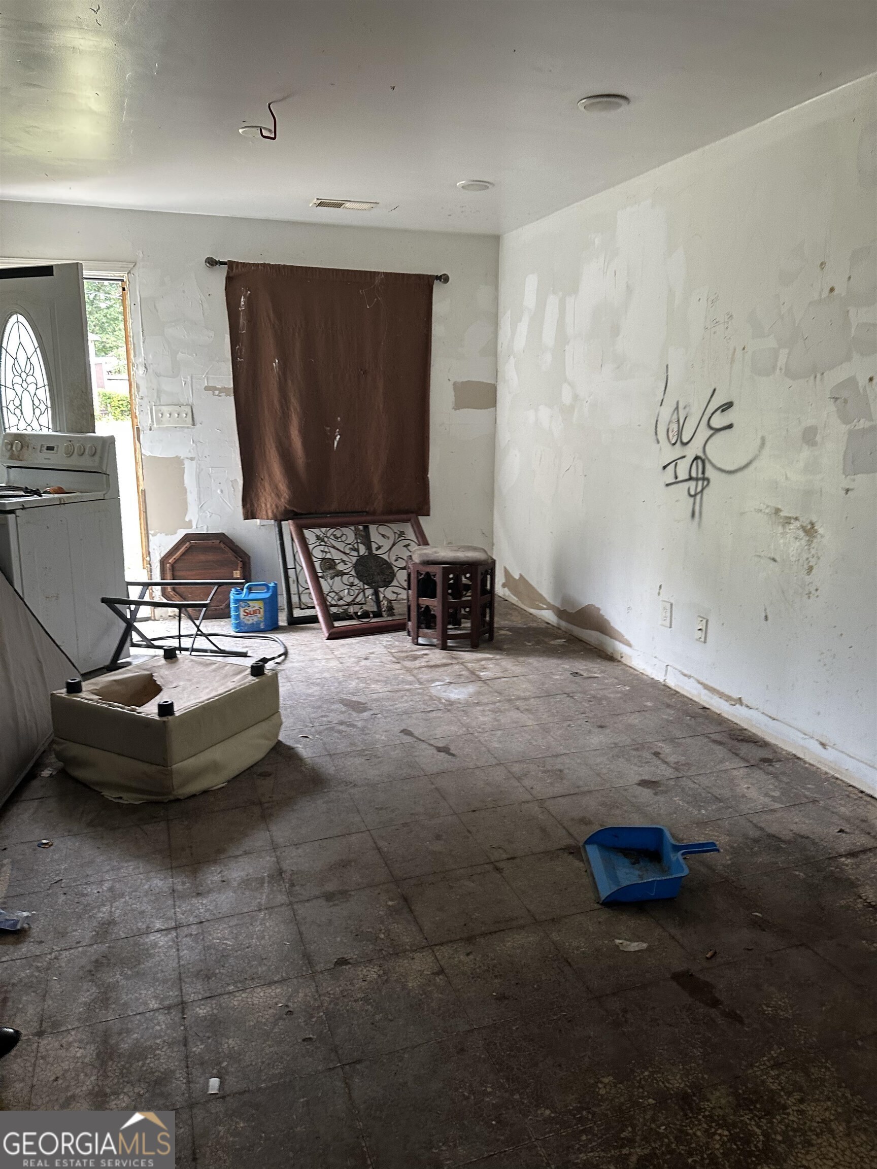 2960 Jadan Place Macon, GA 31206 - Photo 9 of 9 a room with a couch