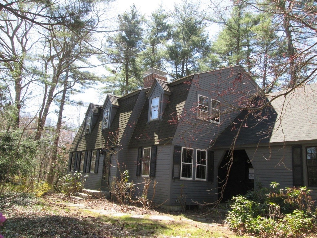66 Westcott Road Harvard, MA 01451 - Photo 36 of 38 a front view of house with yard and trees around