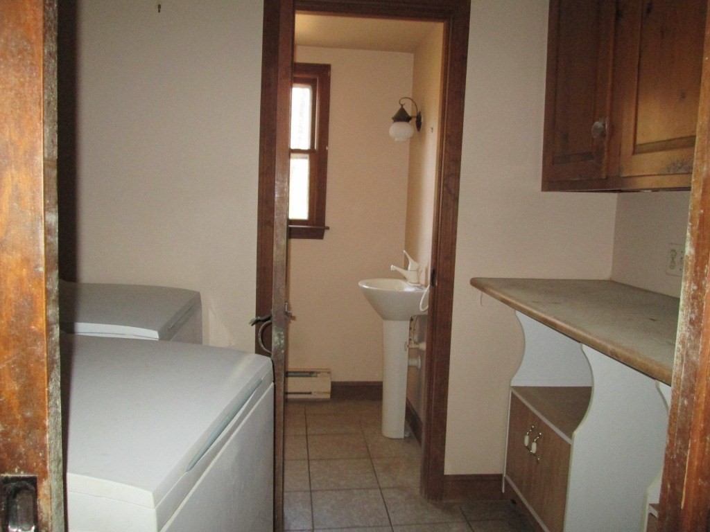 66 Westcott Road Harvard, MA 01451 - Photo 6 of 38 a bathroom with a sink and toilet