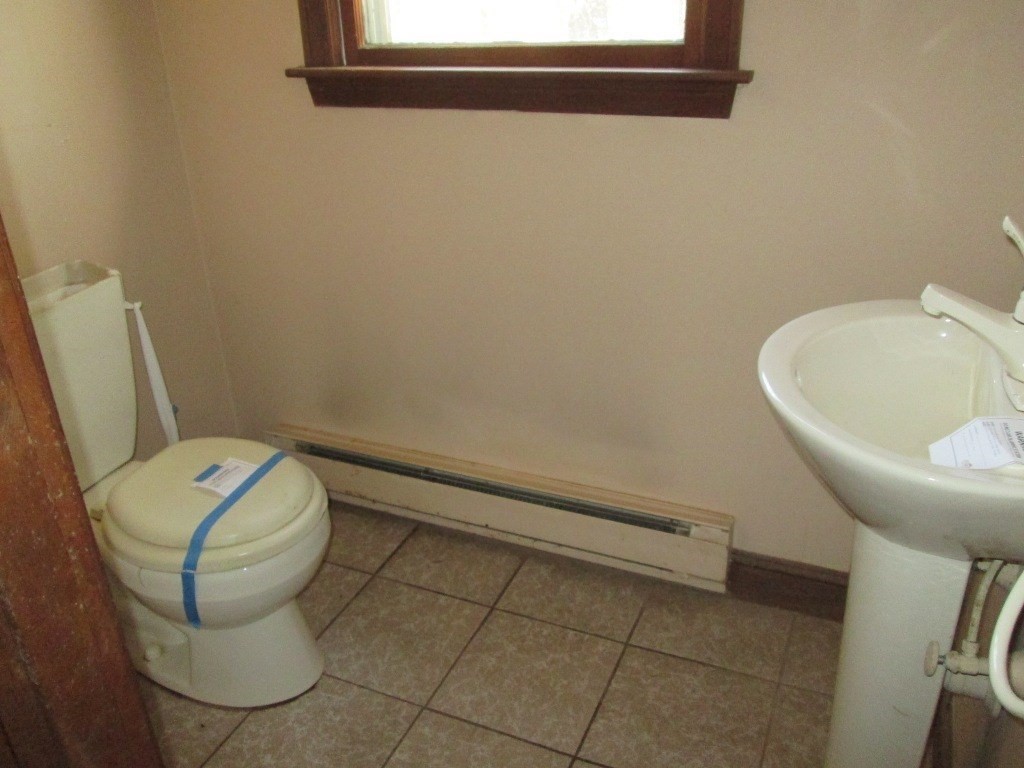 66 Westcott Road Harvard, MA 01451 - Photo 7 of 38 a bathroom with a toilet and a sink
