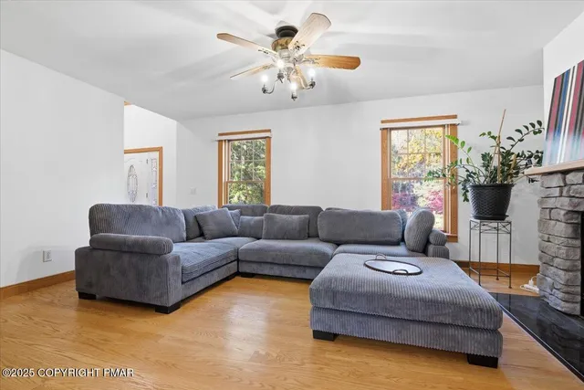 a bathroom with a granite countertop sink mirror and vanity