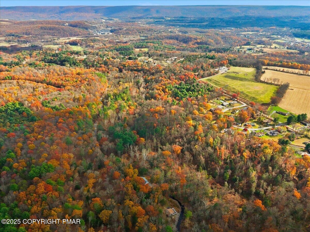 563 Pensyl Creek Road Stroudsburg, PA 18360 - Photo 141 of 143 an aerial view of residential houses with outdoor space