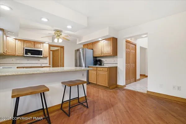 a bedroom with a bed and a table