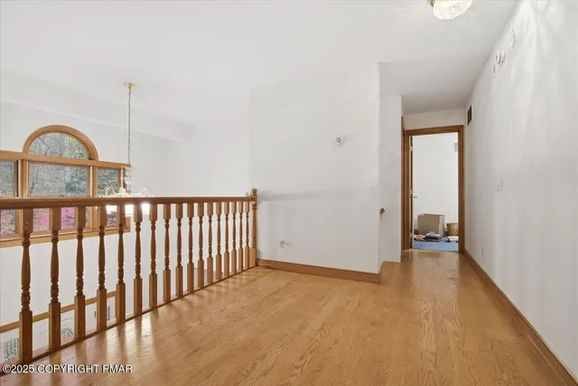 a view of a house with backyard and deck