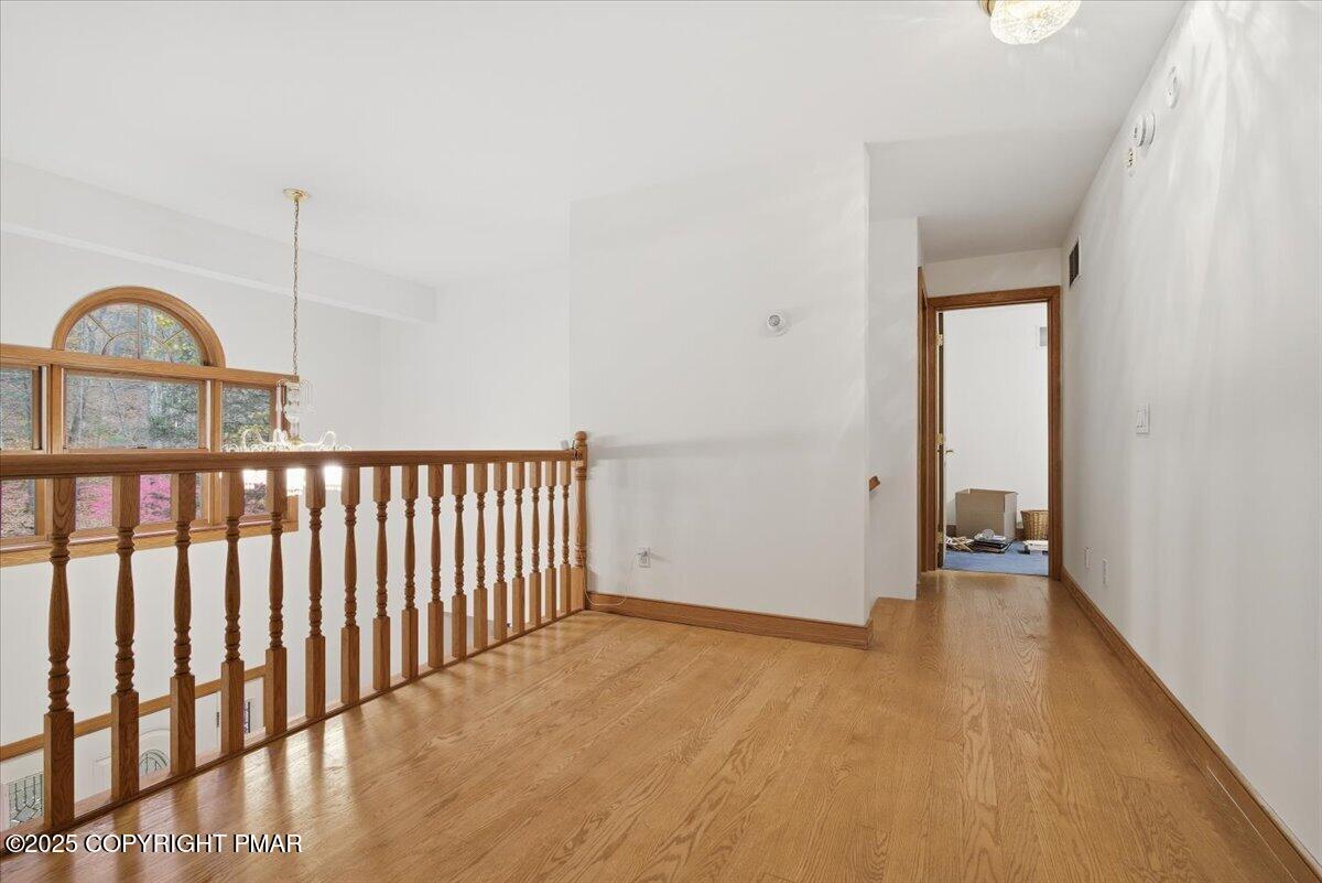 563 Pensyl Creek Road Stroudsburg, PA 18360 - Photo 42 of 143 a view of an empty room with a window