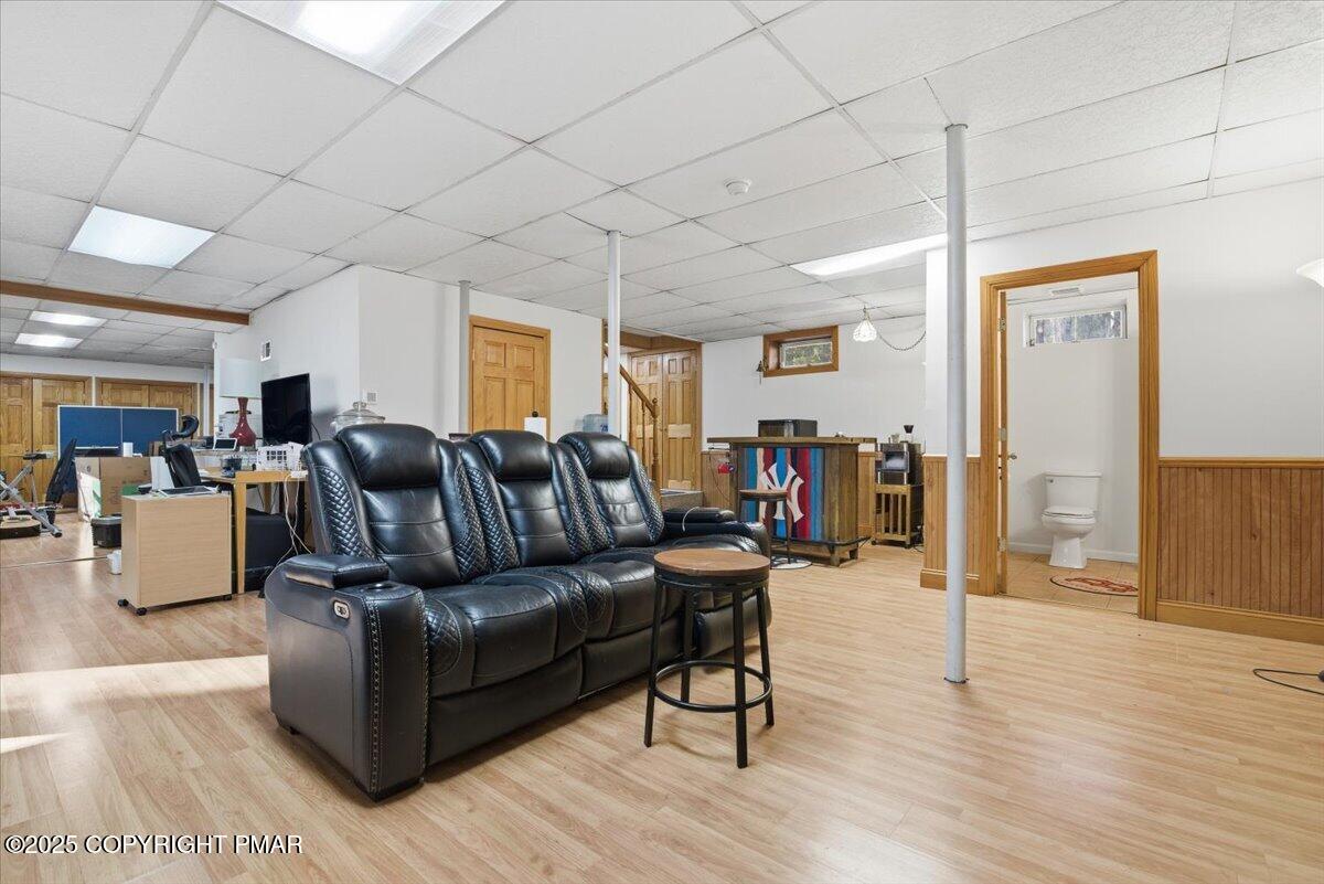 563 Pensyl Creek Road Stroudsburg, PA 18360 - Photo 65 of 143 a living room with furniture and wooden floor