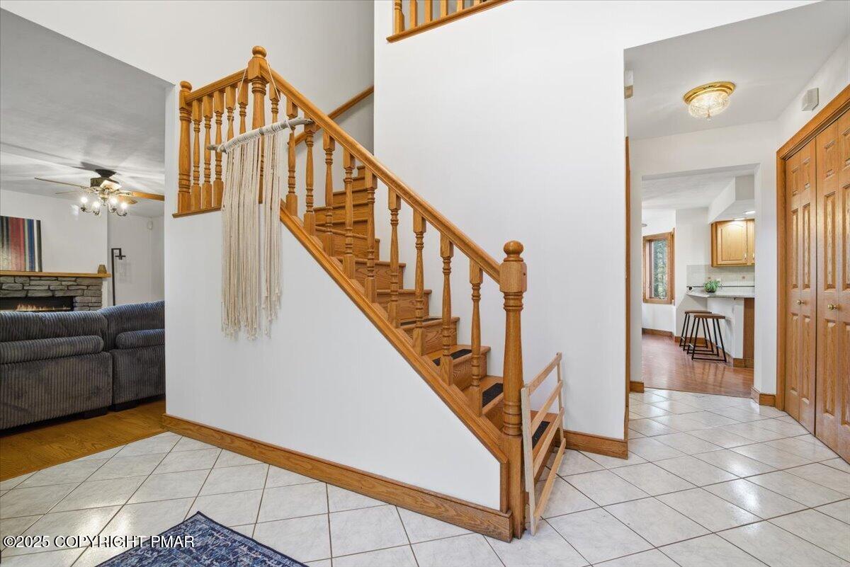563 Pensyl Creek Road Stroudsburg, PA 18360 - Photo 8 of 143 a view of a livingroom with furniture and stairs