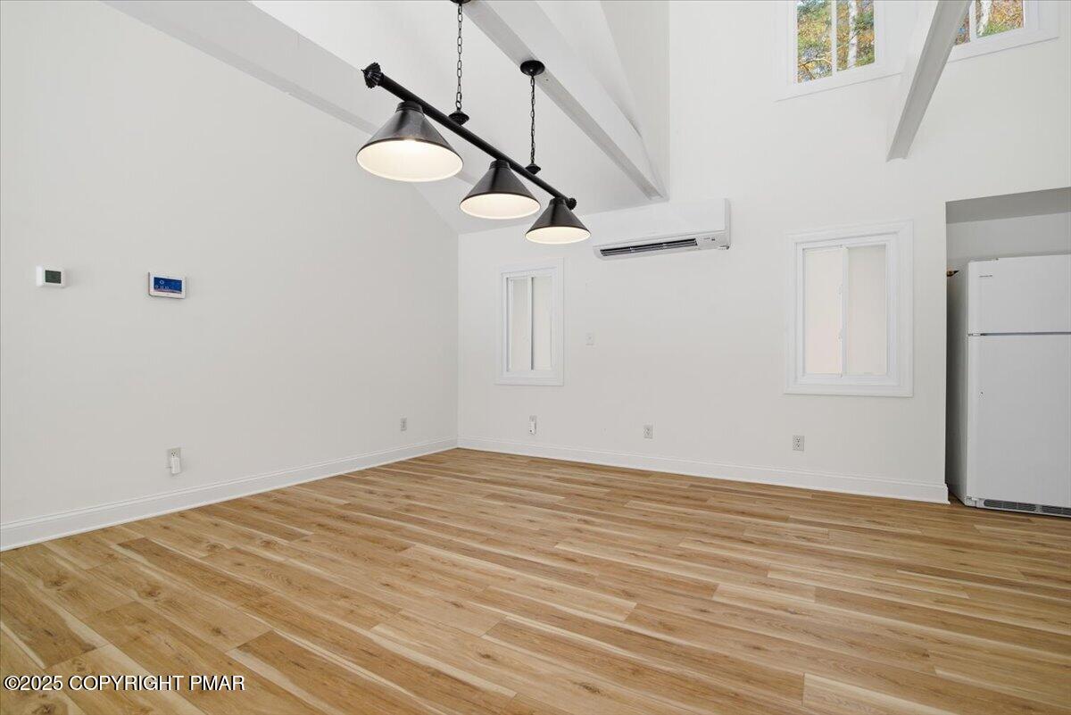 563 Pensyl Creek Road Stroudsburg, PA 18360 - Photo 84 of 143 a view of empty room with wooden floor