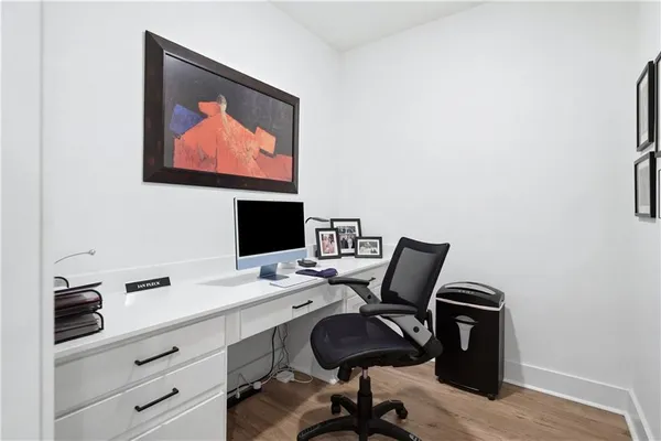 a view of a workspace with furniture