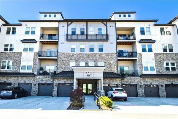 a view of a building with a sink and dishwasher