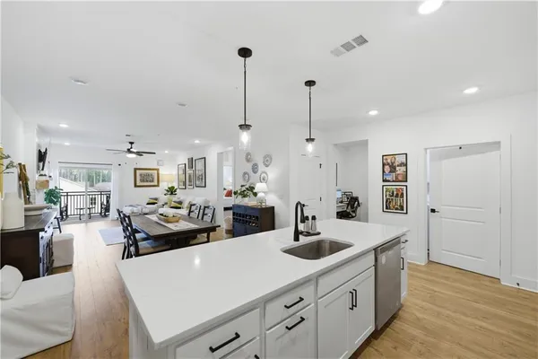 a kitchen with counter top space and appliances