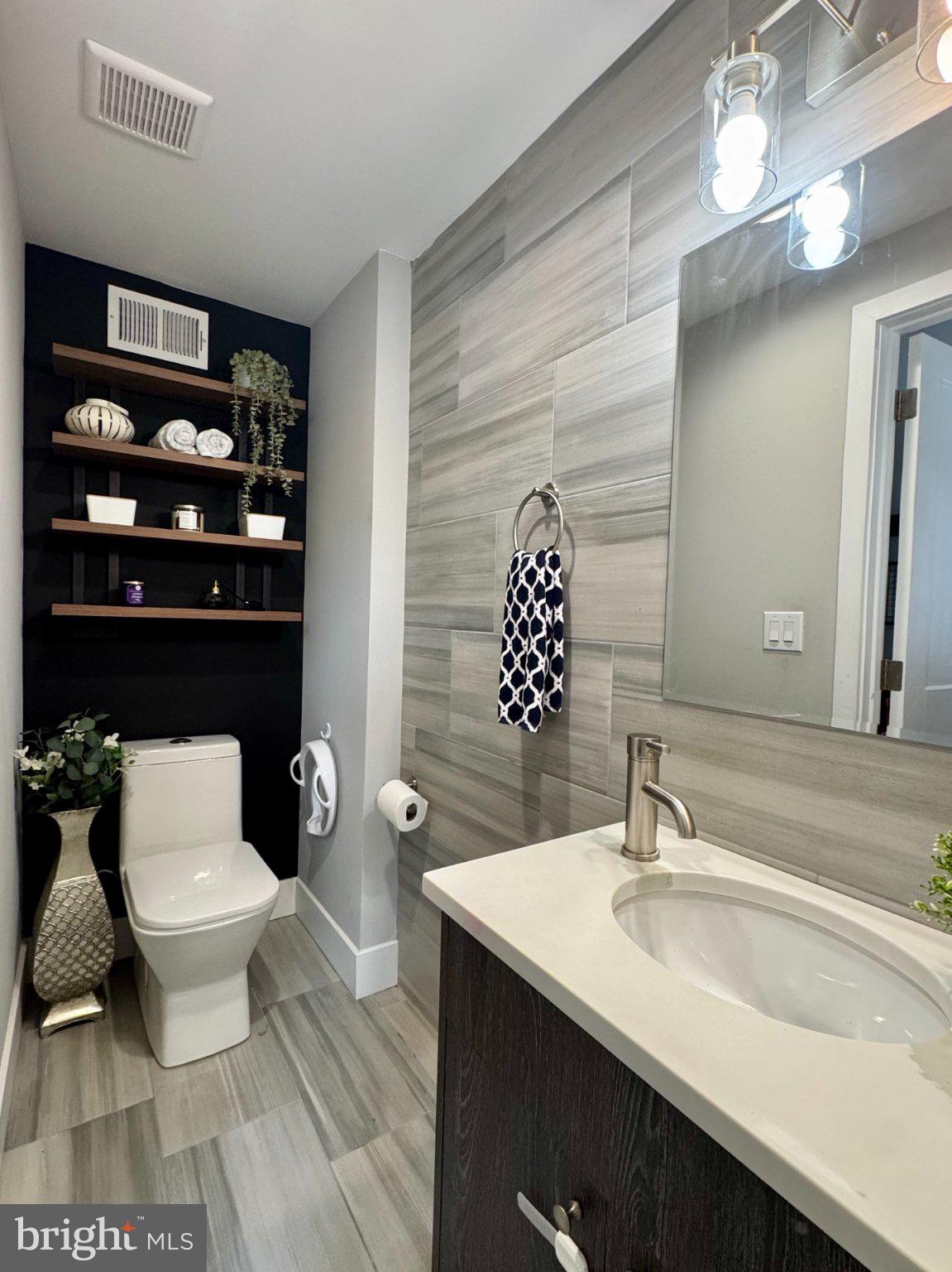 1217 LeCount Street Philadelphia, PA 19121 - Photo 13 of 29 Sleek modern bathroom with stylish accents.
