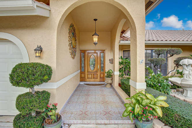 4573 Bucida Road Boynton Beach, FL 33436 - Photo 2 of 19 Covered Entry