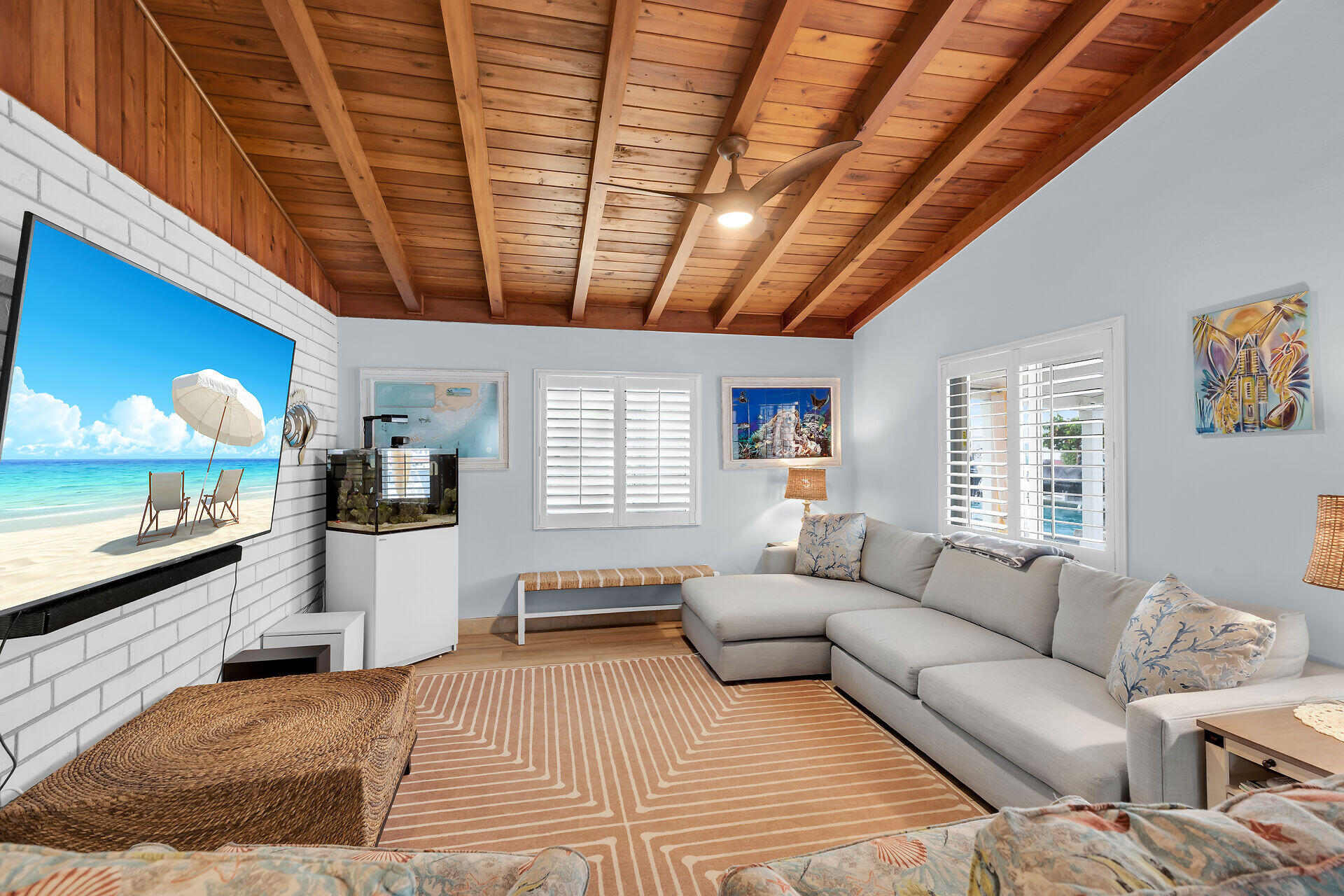 712 Grouper Lane Key Largo, FL 33037 - Photo 13 of 42 a living room with furniture and a flat screen tv