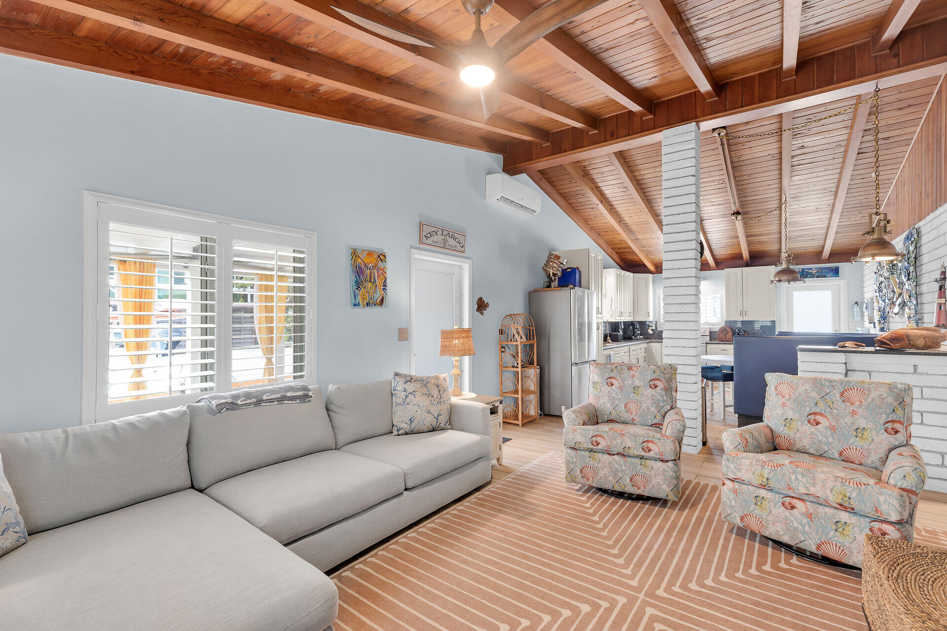 712 Grouper Lane Key Largo, FL 33037 - Photo 25 of 42 a living room with furniture a large bed next to a window