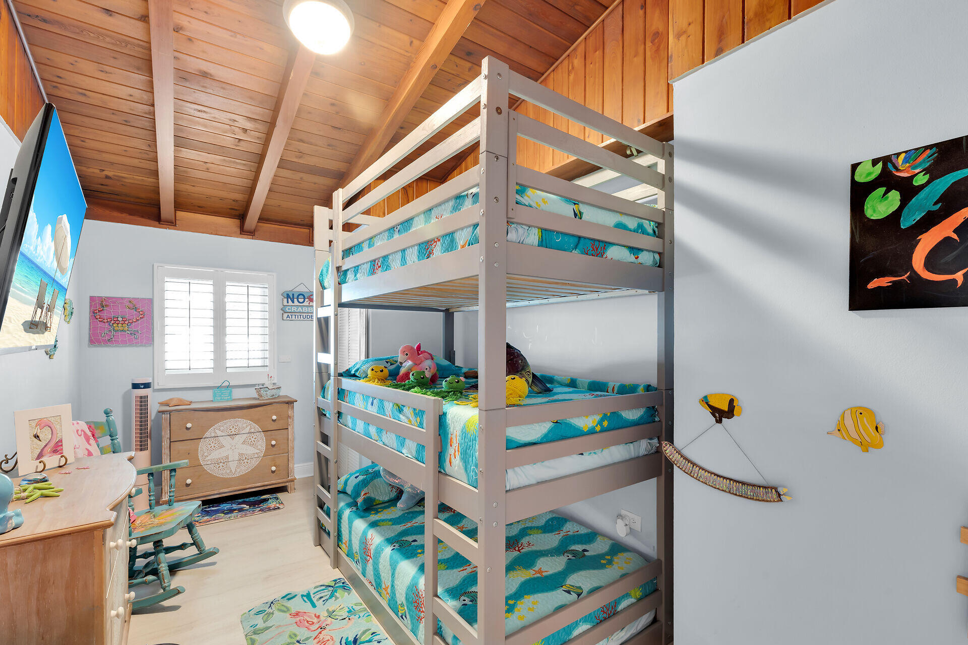 712 Grouper Lane Key Largo, FL 33037 - Photo 33 of 42 a utility room with toys and windows