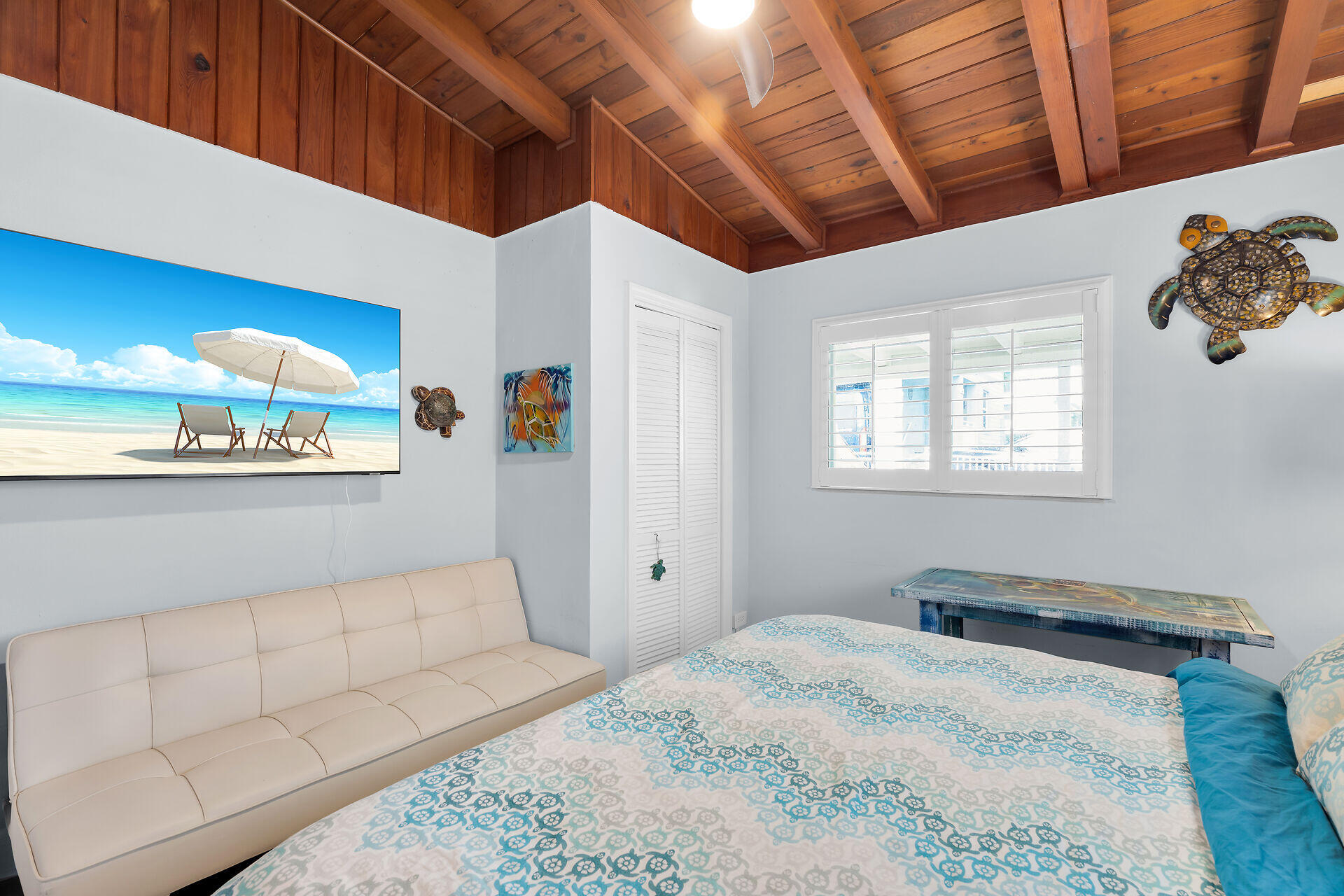 712 Grouper Lane Key Largo, FL 33037 - Photo 36 of 42 a bedroom with a bed and a window