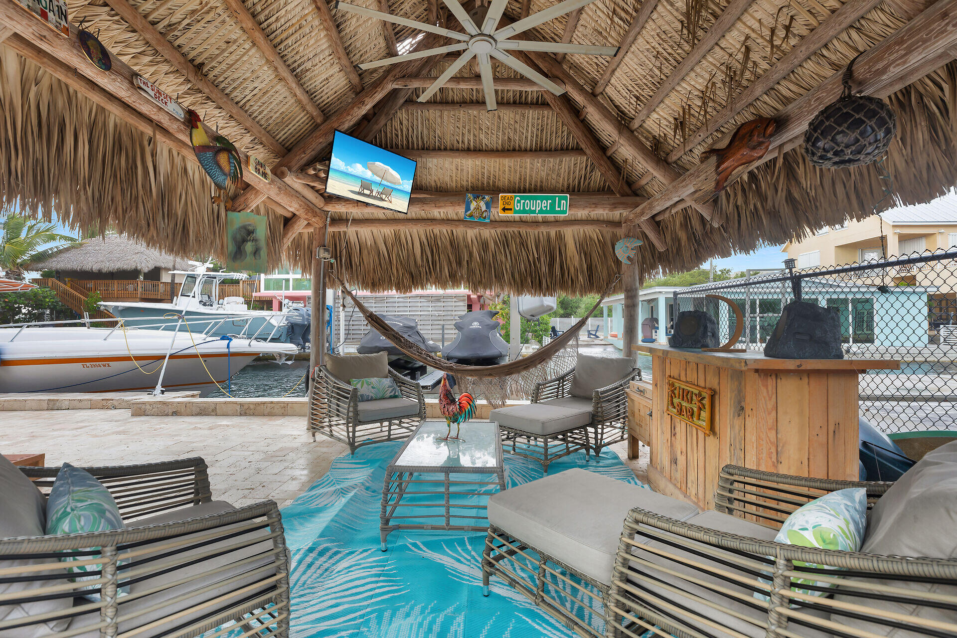 712 Grouper Lane Key Largo, FL 33037 - Photo 5 of 42 a view of a chairs and table in wooden roof