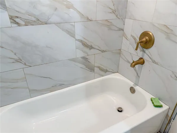 a bathroom with a tub