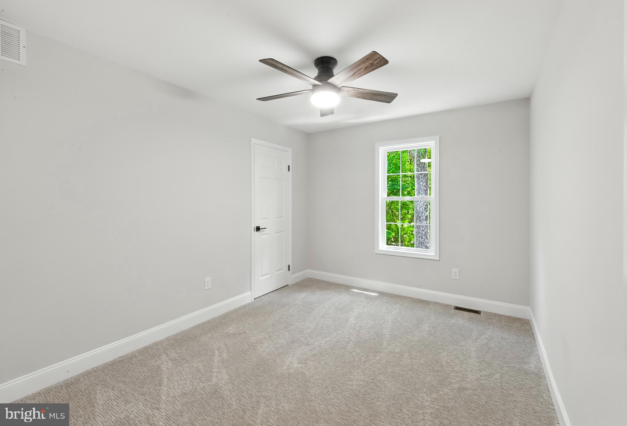24 Muskingum Drive Shamong, NJ 08088 - Photo 18 of 24 wooden floor in an empty room with a window