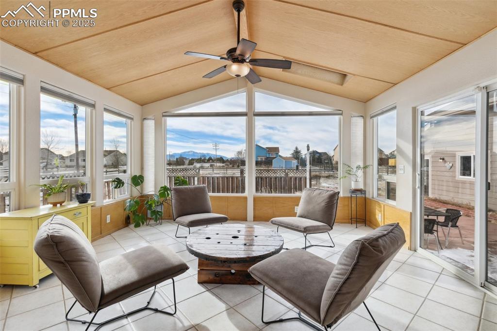 8518 Bohleen Road Peyton, CO 80831 - Photo 14 of 44 a living room with furniture and a large window