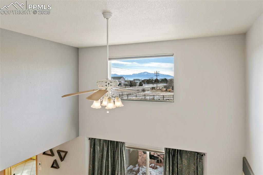 8518 Bohleen Road Peyton, CO 80831 - Photo 24 of 44 a view of a livingroom with wooden floor