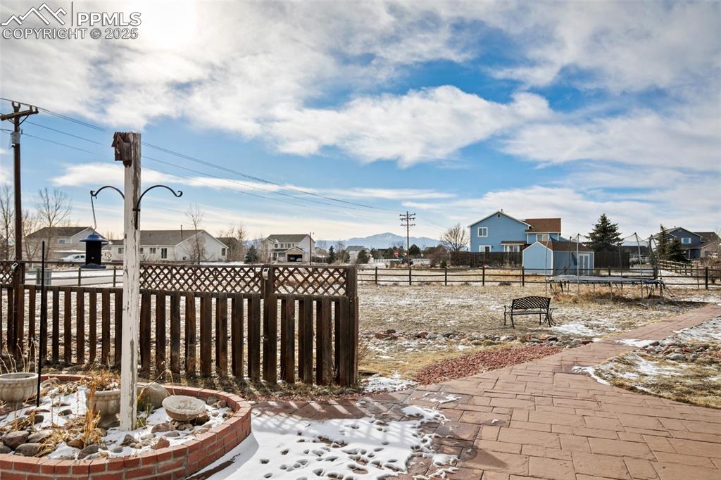 8518 Bohleen Road Peyton, CO 80831 - Photo 36 of 44 a view of a houses with a yard