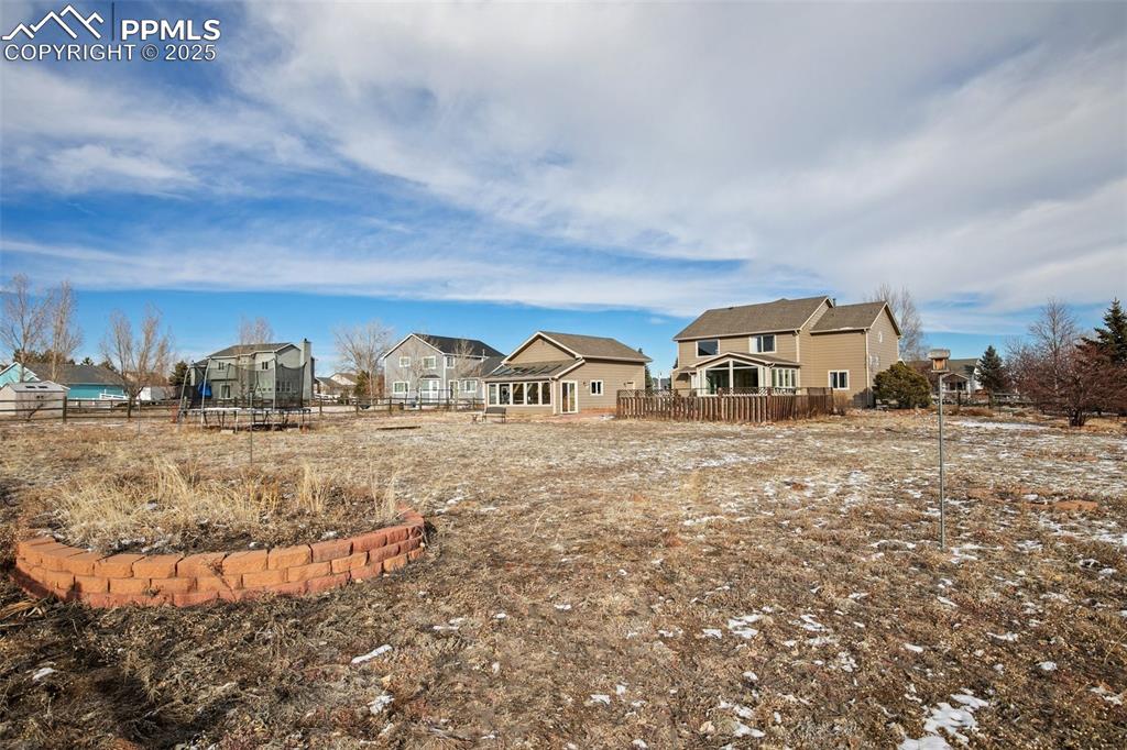 8518 Bohleen Road Peyton, CO 80831 - Photo 38 of 44 a front view of a house with street