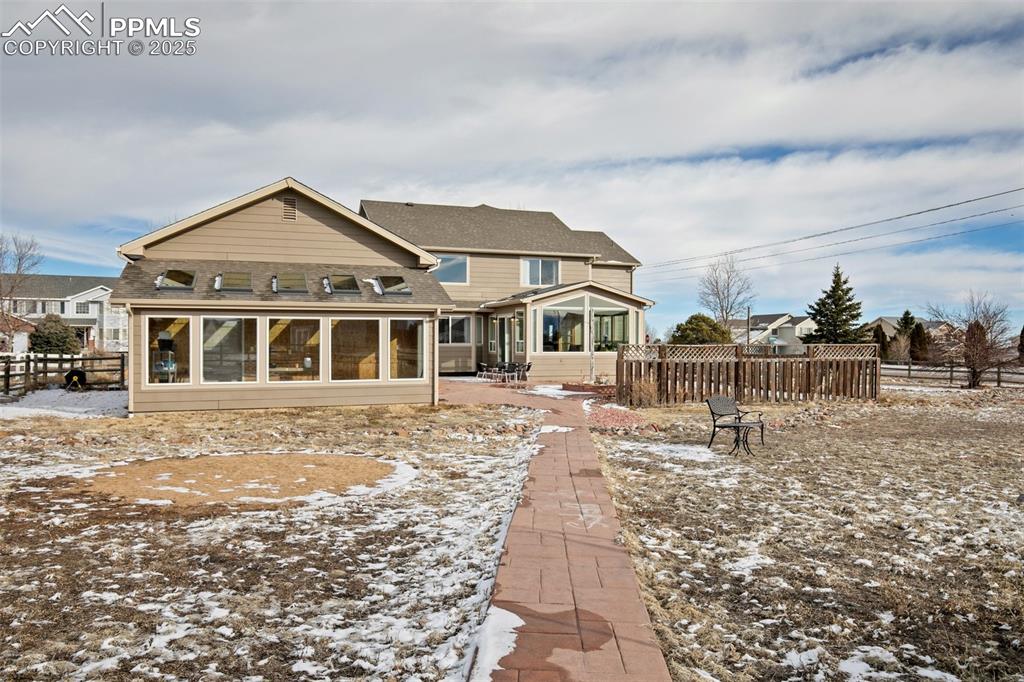 8518 Bohleen Road Peyton, CO 80831 - Photo 39 of 44 a front view of a house with a yard