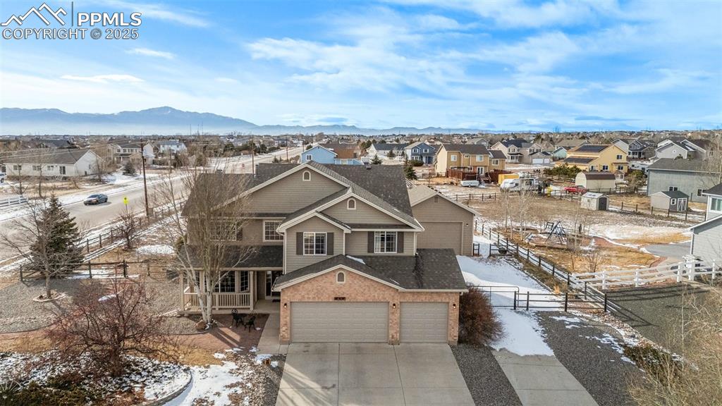 8518 Bohleen Road Peyton, CO 80831 - Photo 40 of 44 an aerial view of residential houses with outdoor space