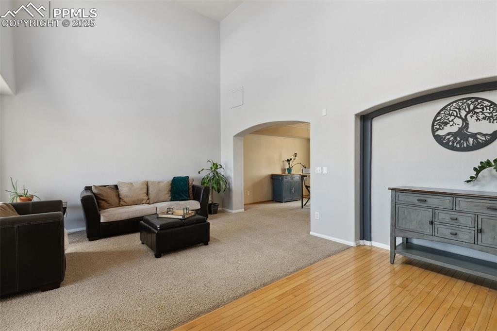 8518 Bohleen Road Peyton, CO 80831 - Photo 9 of 44 a living room with furniture and a table