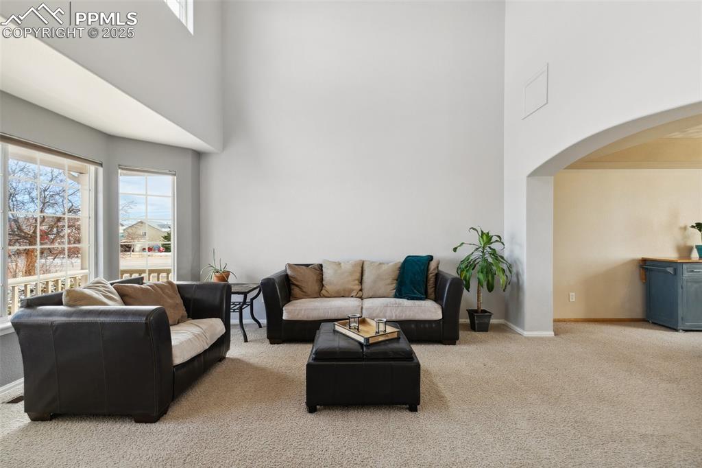 8518 Bohleen Road Peyton, CO 80831 - Photo 10 of 44 a living room with furniture and a large window