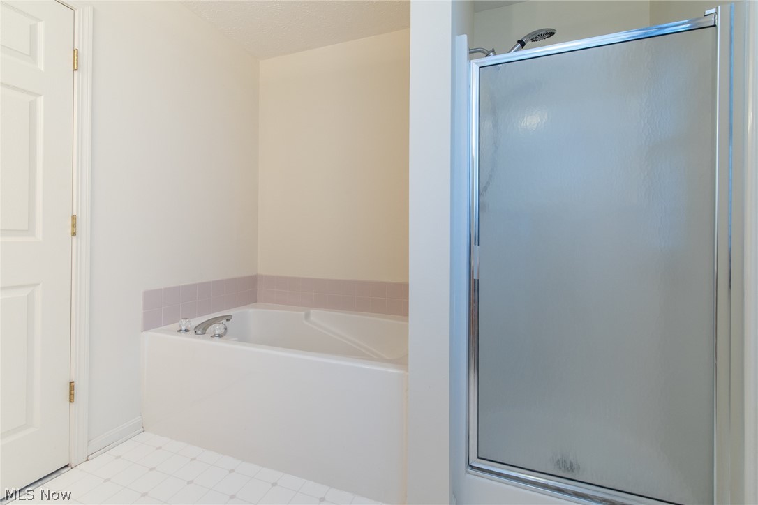 4425 Brooks Road Cleveland, OH 44105 - Photo 19 of 35 Master Bath with a shower a tub