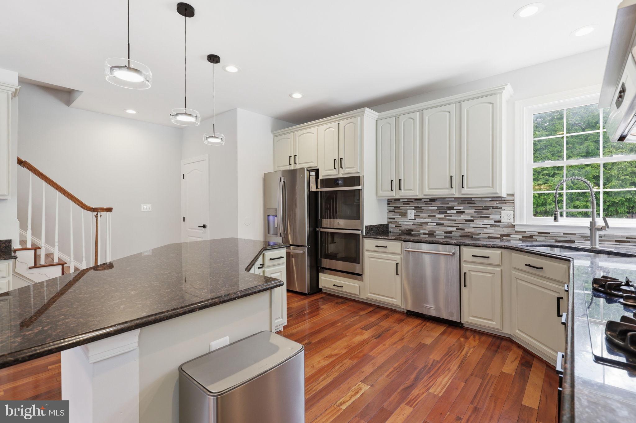 18426 Rim Rock Circle Leesburg, VA 20176 - Photo 22 of 60 Modern kitchen with elegant finishes.