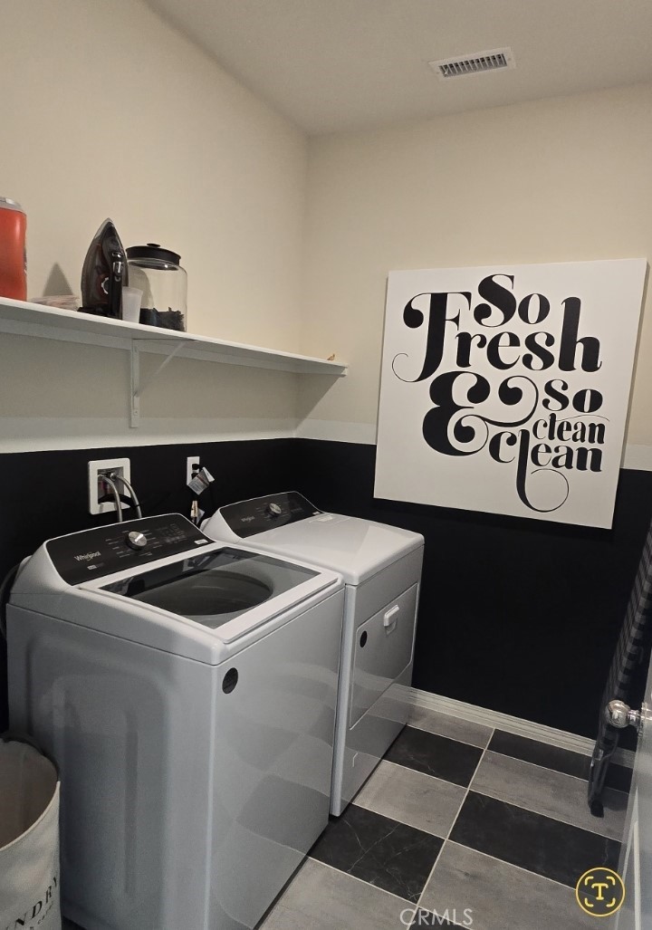 1701 Old Wagon Drive Hemet, CA 92545 - Photo 11 of 15 a utility room with dryer and washer