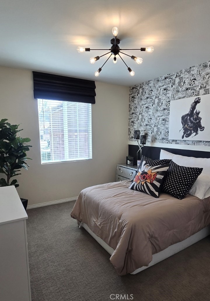 1701 Old Wagon Drive Hemet, CA 92545 - Photo 13 of 15 a bedroom with a bed and window