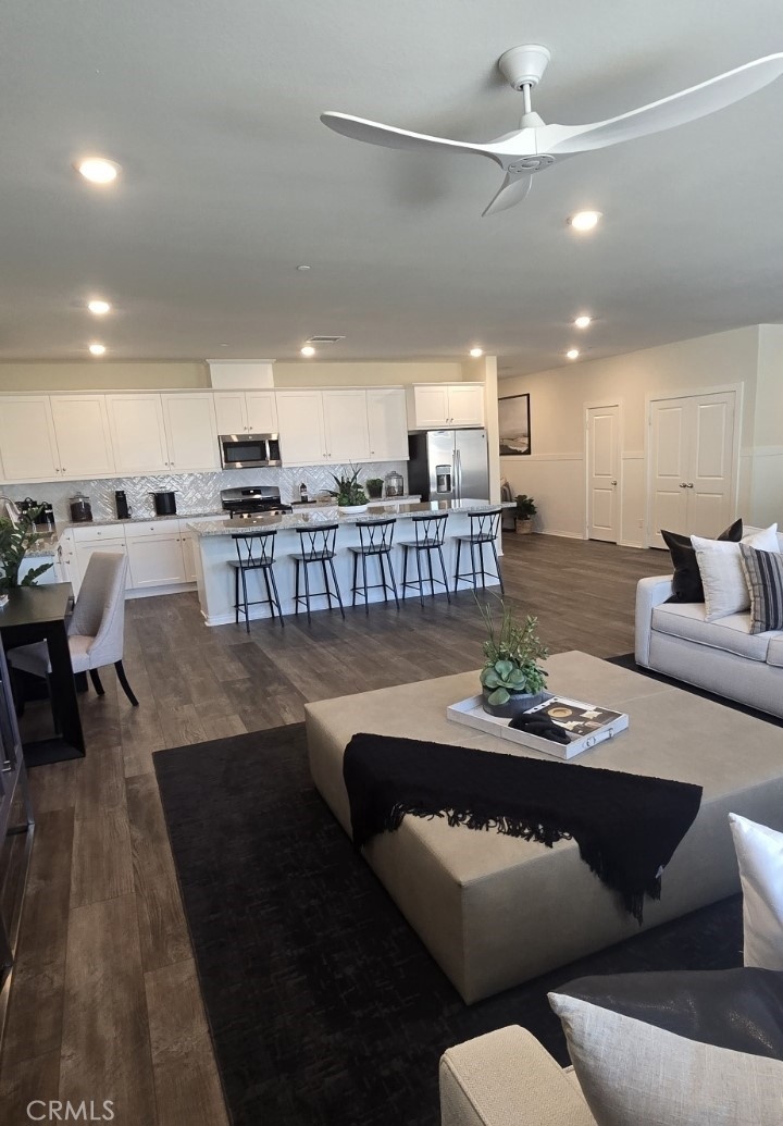 1701 Old Wagon Drive Hemet, CA 92545 - Photo 4 of 15 a living room with furniture and a table