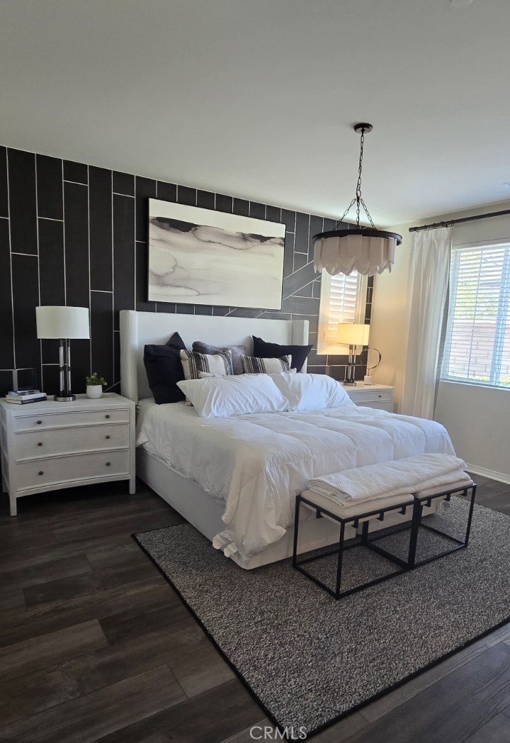 1701 Old Wagon Drive Hemet, CA 92545 - Photo 7 of 15 a bedroom with a bed a window and dresser