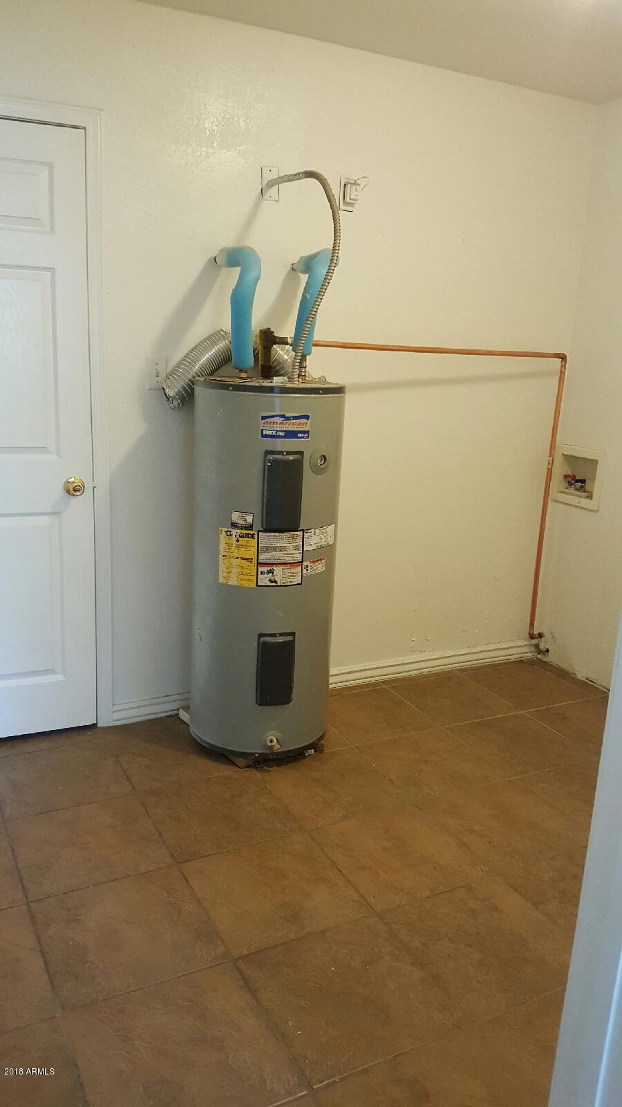4123 West Osborn Road Phoenix, AZ 85019 - Photo 7 of 12 Indoor Laundry room ,inside