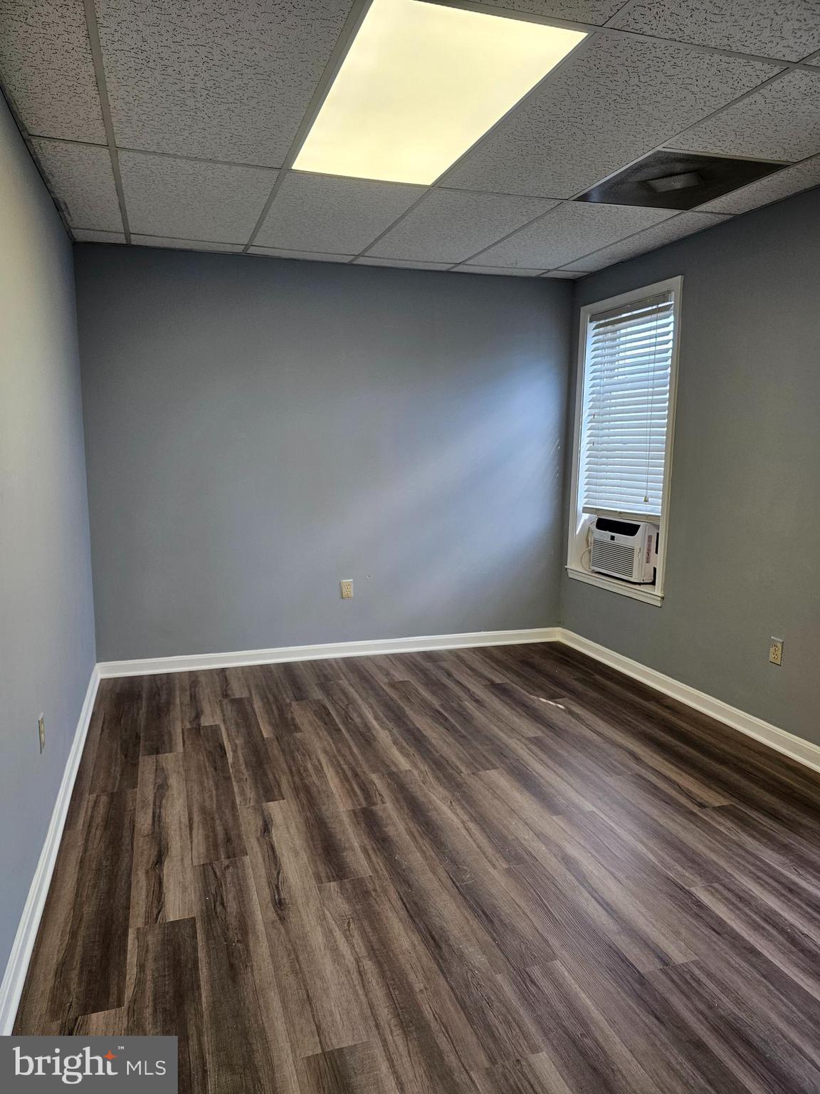 505 East Main Street, Unit 2 Front Royal, VA 22630 - Photo 5 of 9 a view of empty room with wooden floor
