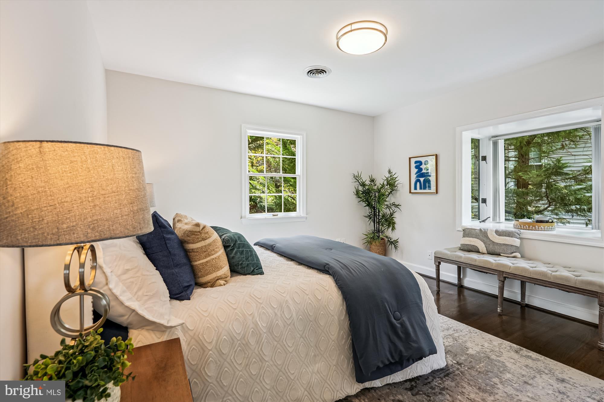 7206 Pinehurst Parkway Chevy Chase, MD 20815 - Photo 21 of 56 a bedroom with a large bed and a window