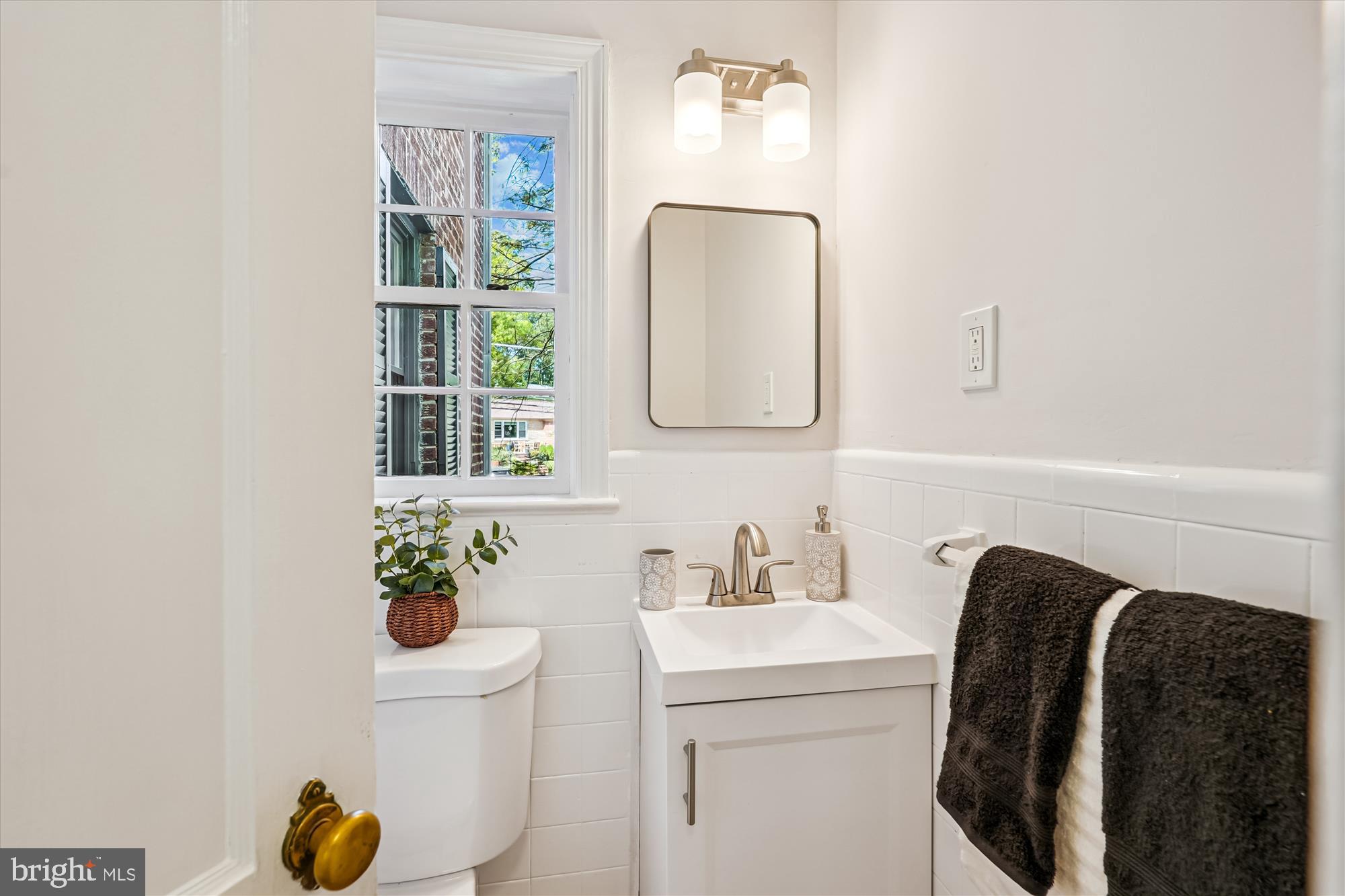 7206 Pinehurst Parkway Chevy Chase, MD 20815 - Photo 3 of 56 a bathroom with a toilet and a sink