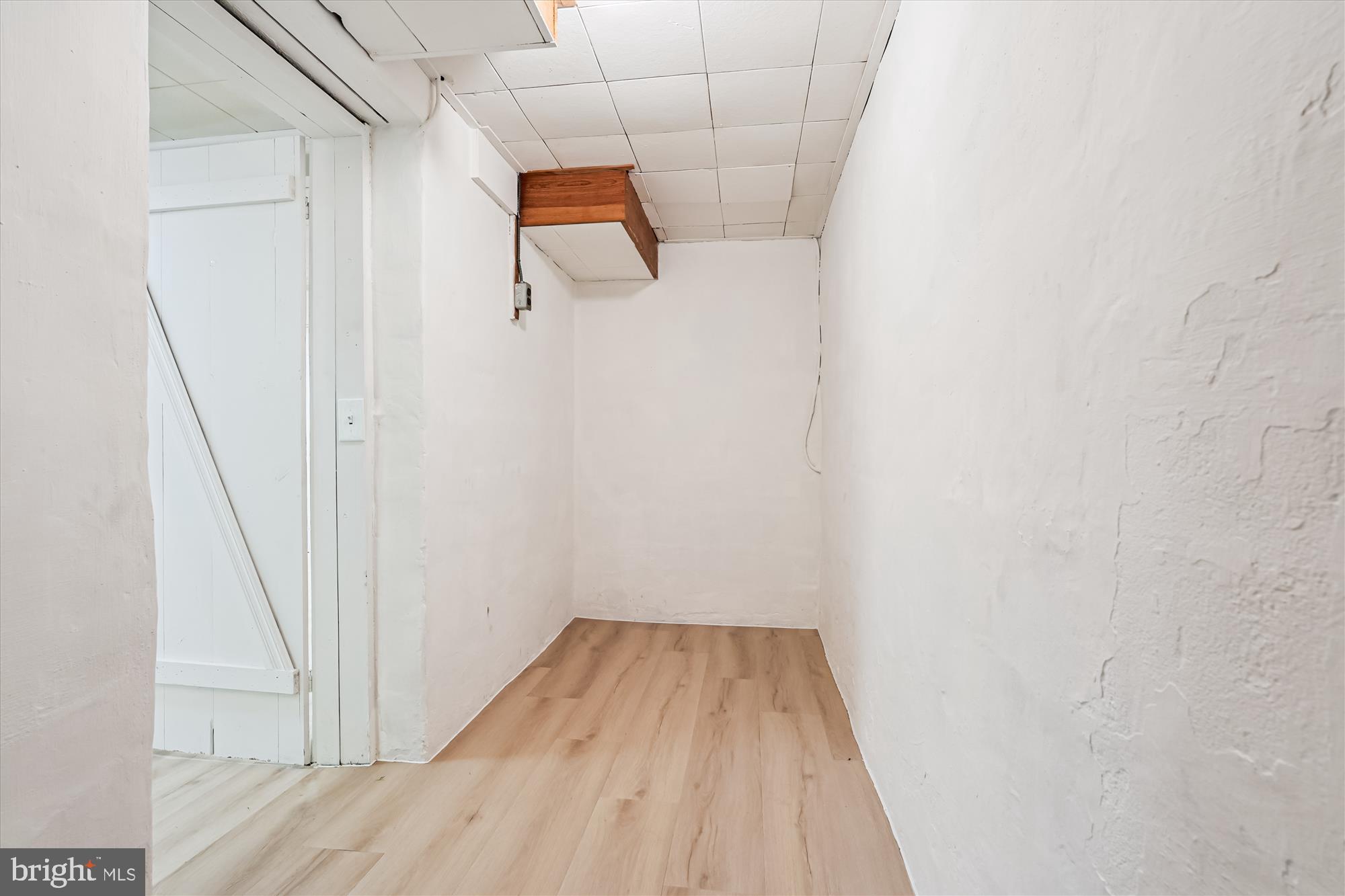 7206 Pinehurst Parkway Chevy Chase, MD 20815 - Photo 36 of 56 a view of a room with wooden floor