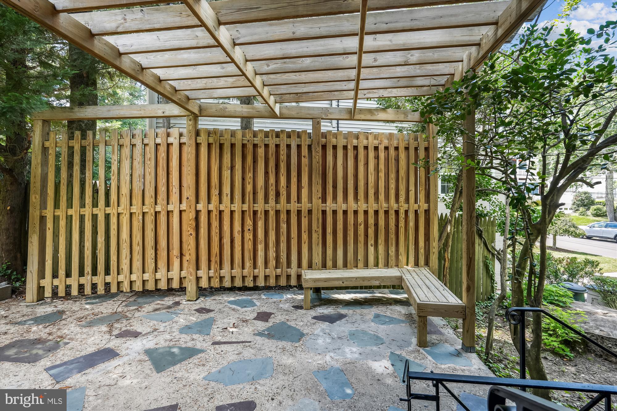 7206 Pinehurst Parkway Chevy Chase, MD 20815 - Photo 42 of 56 a view of a backyard with a wooden fence