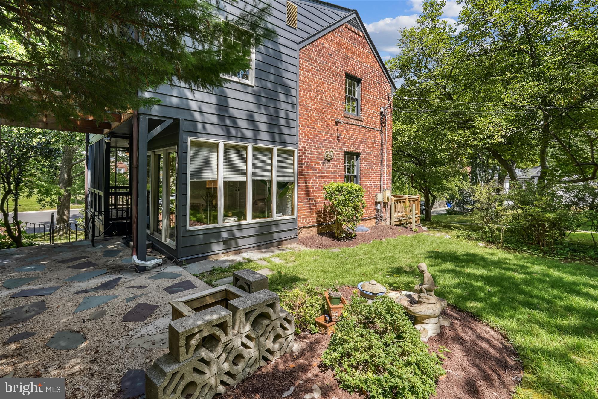7206 Pinehurst Parkway Chevy Chase, MD 20815 - Photo 44 of 56 front view of a house with a yard