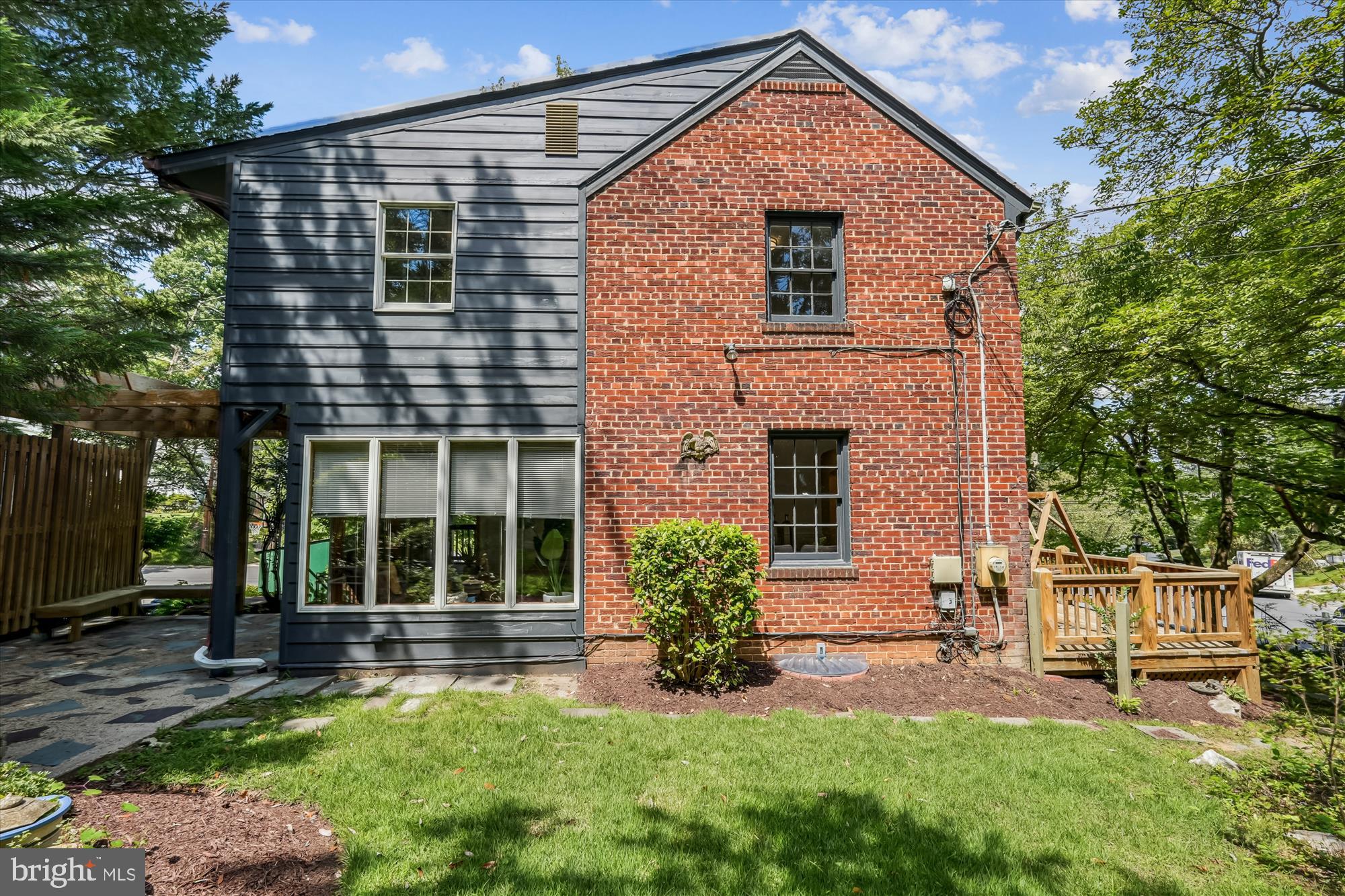 7206 Pinehurst Parkway Chevy Chase, MD 20815 - Photo 45 of 56 front view of a house with a yard
