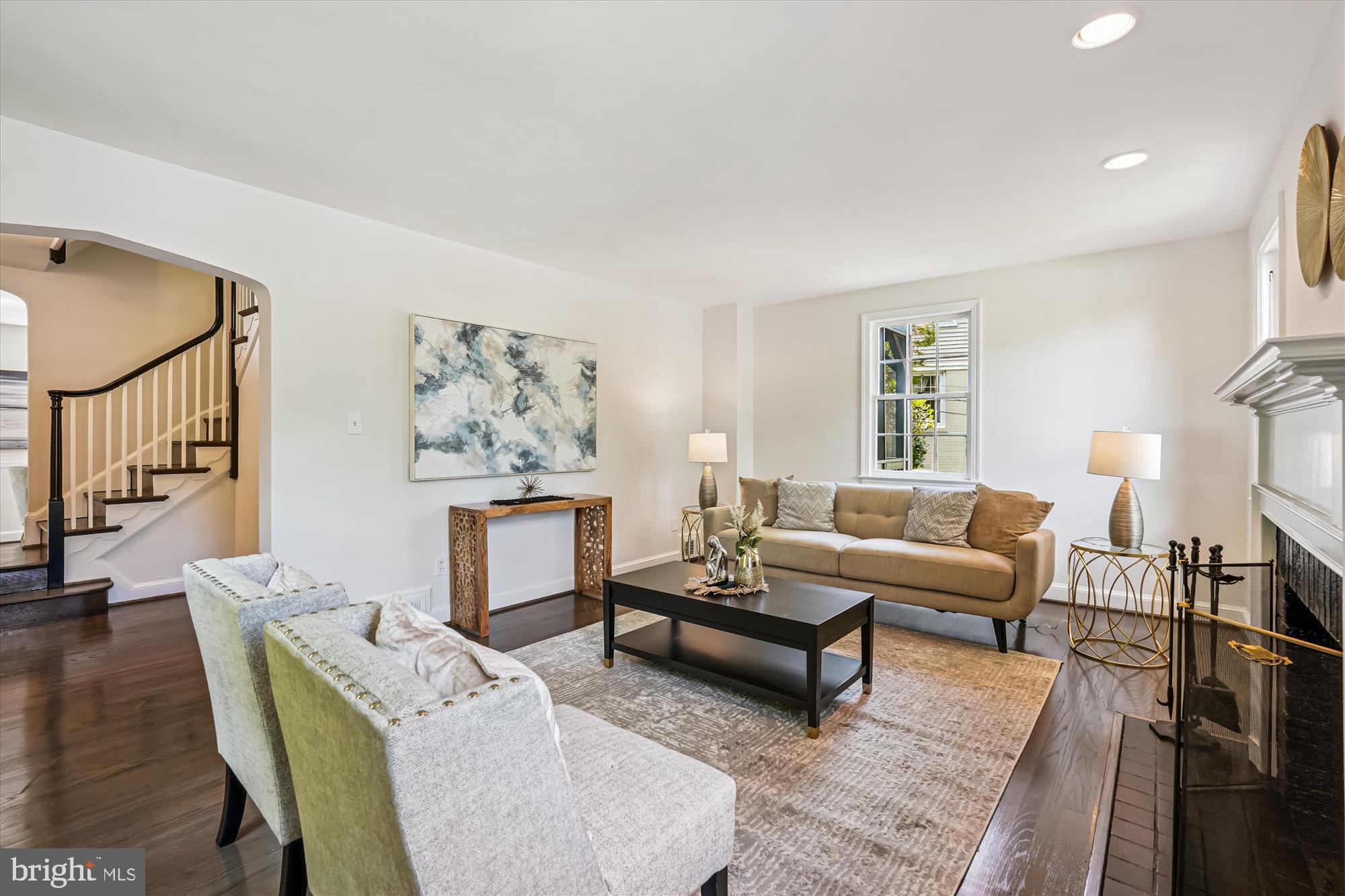 7206 Pinehurst Parkway Chevy Chase, MD 20815 - Photo 5 of 56 a living room with furniture and a painting on the wall
